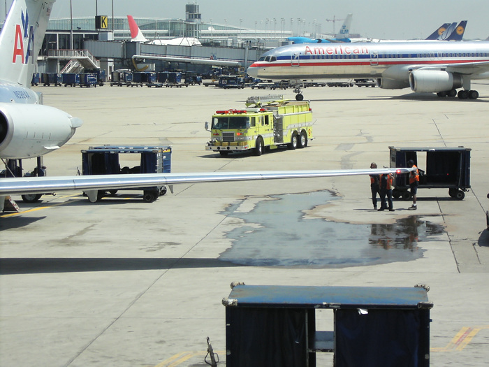 fuel spill in Chicago delays our flight